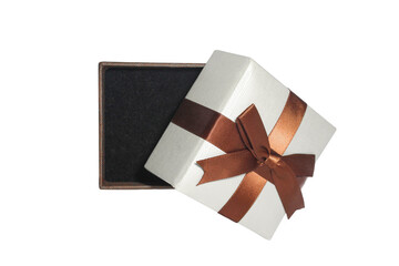 Open gift box with brown ribbon isolated on white background. Small empty holiday/jewelry box