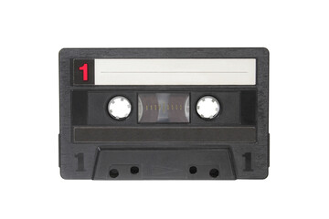 Black cassette isolated on white background. Audio tape macro photo