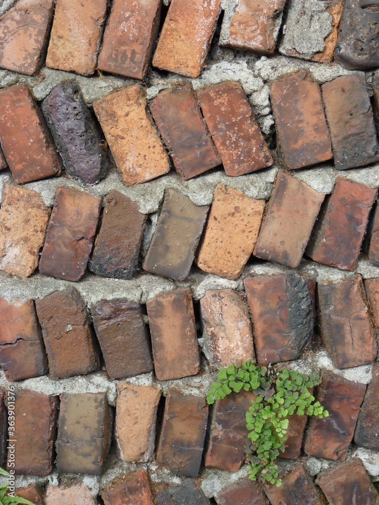 Poster Closeup shot of an old brick wall