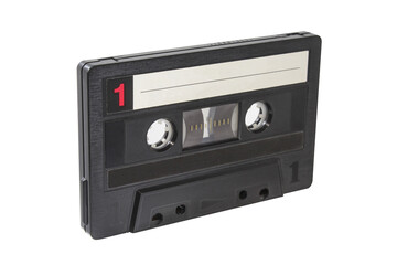 Black cassette isolated on white background. Audio tape macro photo