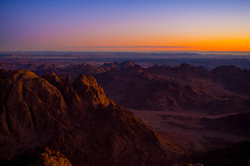 Colorful amazing Sunrise at Sinai Mountain, Beautiful dawn in Egypt, Beautiful view from the mountain, Egypt, Sinai, Mount Moses. View from road. Sunrise over Red sea.