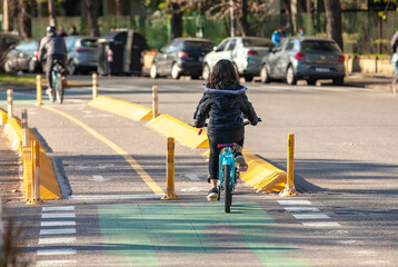 children on a bike ride in Buenos Aires during a pandemic