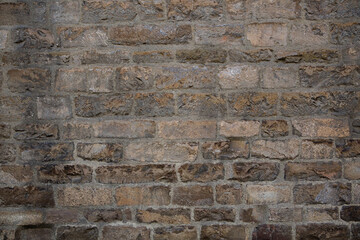 Antique brickwork wall. Masonry of ancient half-destroyed wall. Abstract texture or background.