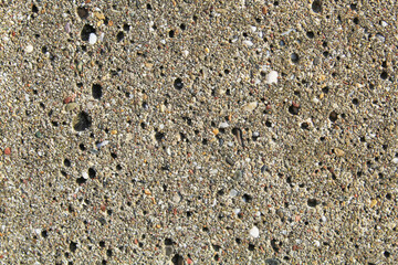 Concrete wall texture. Close up of old rough concrete backdrop