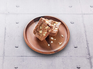 Brownie on wooden plate