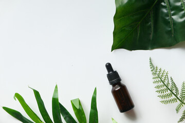 Bottle With Herbs On White Background Top Down 