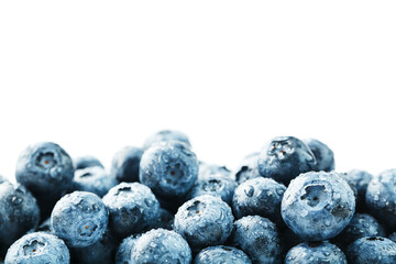 Blueberries isolated on a white background. A scattering of ripe, juicy, delicious and healthy berries.