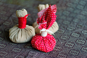 Ayurveda massage powder pads - Kizhi. Body care. Spa body massage treatment.