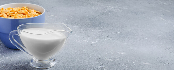 Corn flakes in a plate. Healthy breakfast. Copy space