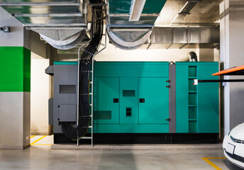 Huge backup electrical power generator in office building.   - obrazy, fototapety, plakaty