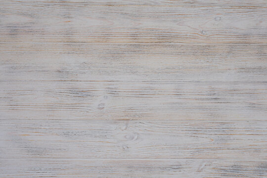 White textured wood background. View from above.