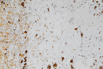 old metal surface with peeling paint. rusty metal background