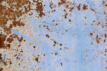 old metal surface with peeling paint. rusty metal background