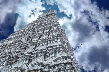 Beautiful view of gopuram in the Hindu Temple and Amazing blue sky background at Hindu Temple.