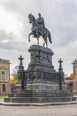Fototapeta na wymiar Monument to King of Saxony - equestrian statue in front of the Semper Opera. Dresden, Germany.