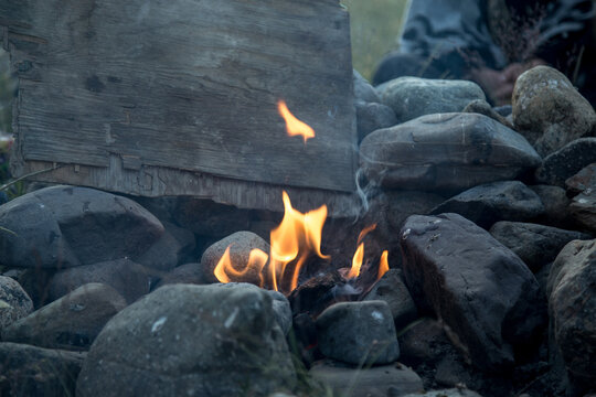 Safety fireplace with stone. Trekking in the mountains. Traveling with tents to wild places. Travel to Altai. Image with selective focus.