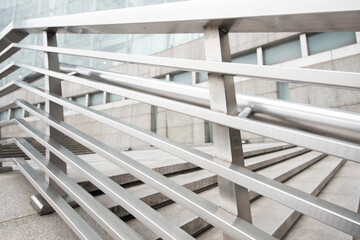 A close-up of the stainless steel handrail fence of the outdoor plaza.