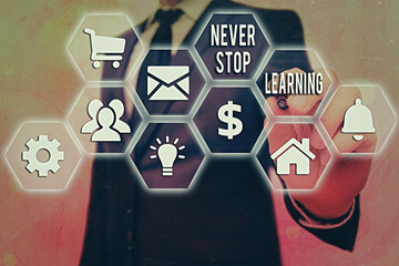 Conceptual hand writing showing Never Stop Learning. Concept meaning continuous education and...