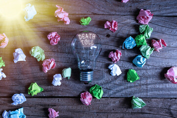 Conceptual hand writing showing Death Toll. Concept meaning the number of deaths resulting from a...