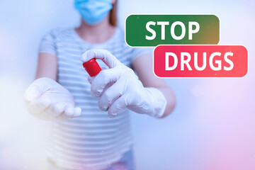 Conceptual hand writing showing Stop Drugs. Concept meaning put an end on the dependence on...