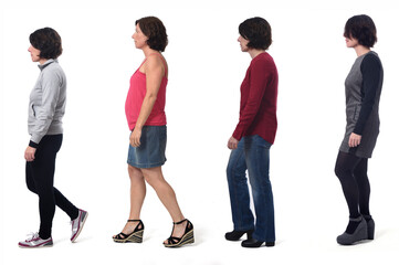 Obraz premium woman dressed in different outfits like sportswear, blue jeans, dress and skirt walking on white background