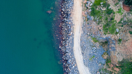 Drones take pictures of rocks and roads along the coast