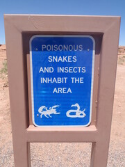 Desert rest stop sign Poisonous Snakes and Insects Inhabit the Area 2011