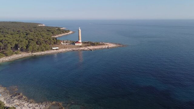 Panoramic aerial view of famous lighthouse Veli Rat with shoreline on island Dugi Otok, Croatia