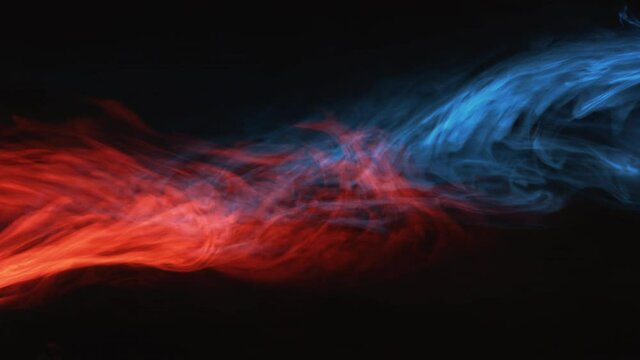 Color vapor background. Hot cold. Blur red blue glowing steam mix flow on black.