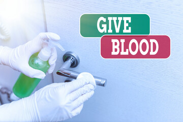 Conceptual hand writing showing Give Blood. Concept meaning an individual voluntarily has blood...