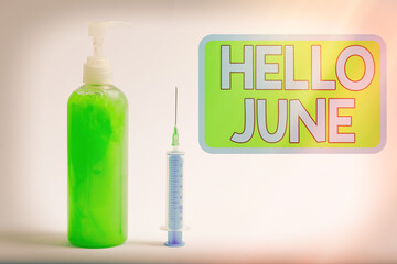 Text sign showing Hello June. Business photo text a new month to plan your activities for fun and adventures Primary medical precautionary equipments for health care protection
