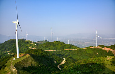 The wind turbine is on the hill