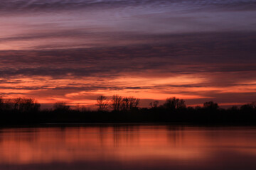 Colorful sunset by the Odra River, Poland.