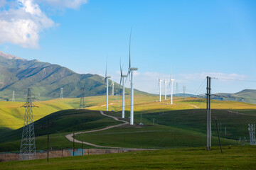 Wind power on the plateau under a blue sky and white clouds