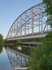 View of the bridge on the Voronezh reservoir from the right bank in summer