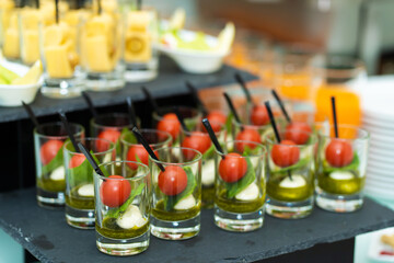 Festive buffet table with many snacks and appetizers