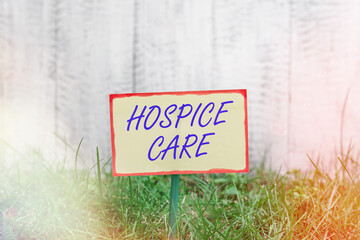 Writing note showing Hospice Care. Business concept for focuses on the palliation of a terminally...