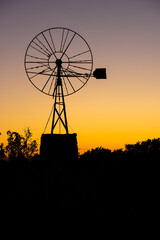 Dawn with an old windmill