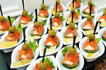 Festive buffet table with many snacks and appetizers