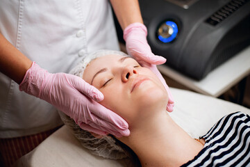 Obraz na płótnie Canvas Cosmetic face massage with medical