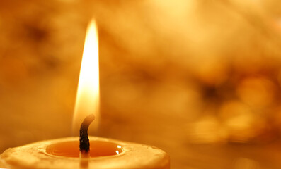 Flame of a candle closeup