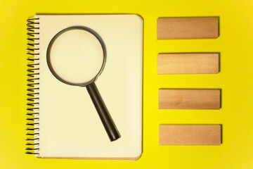 man in white shirt types finance figures on laptop