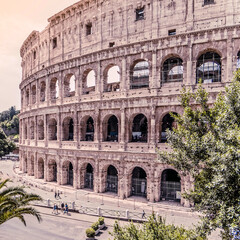 Obraz premium Rome Italy, impressive view of the Colosseum ancient amphitheater under clear blue sky
