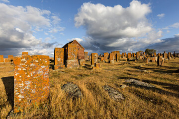 Historical tombs and head stones known as Khachkars or Armenian cross stones, in the ruins of the...