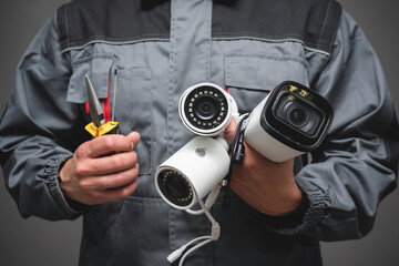 CCTV Installation Wizard concept. Service for installing CCTV cameras. - obrazy, fototapety, plakaty