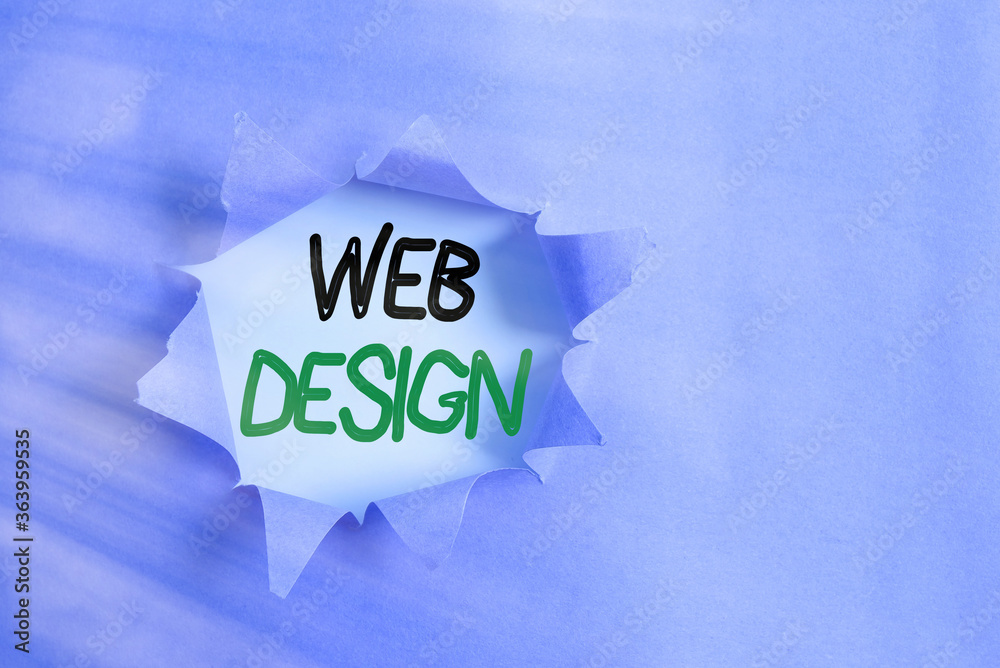 Poster Writing note showing Web Design. Business concept for website creation which includes layout, content, and graphics Rolled ripped torn cardboard above a wooden classic table
