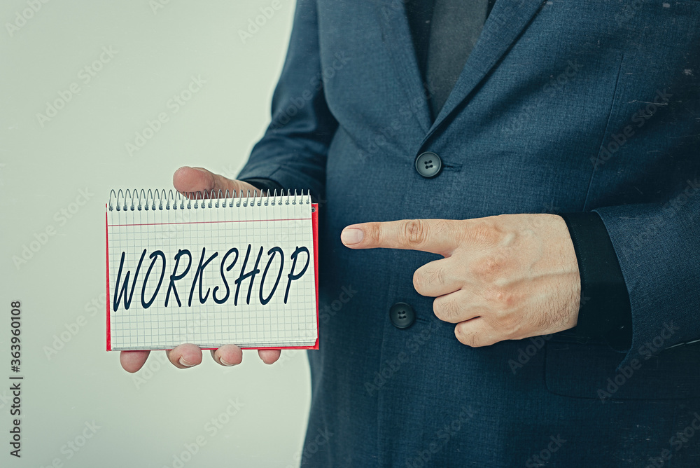 Poster handwriting text workshop. conceptual photo space or a building where the goods are produced or repa