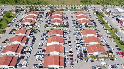 Aerial view of brand new and second hand car dealers site