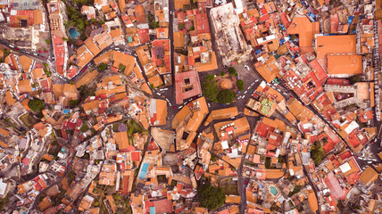 Aerial view of colonial city, top view of Taxco in Guerrero state, México from above.