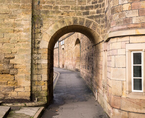 Old stone pavement arch in Belper, Derbyshire, UK